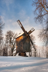 Wooden windmill in winter