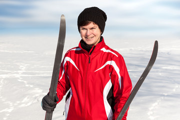 Woman with cross-country skis