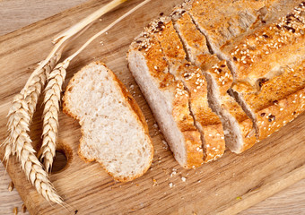 Fresh baked traditional bread and wheat