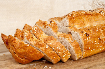 Fresh baked traditional bread and wheat