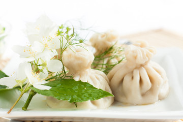 Georgian hinkalii on a white plate