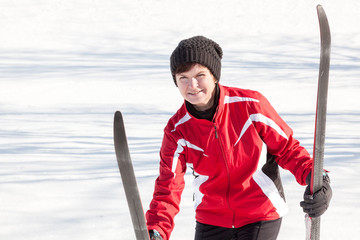 Woman with cross-country skis