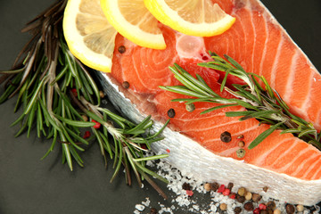 Fresh salmon steak on pan, close up