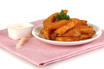 Appetizing village potatoes on plate isolated on white