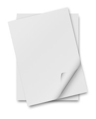 close up of stack of papers with curl on white background