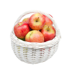 basket with juicy red apples isolated