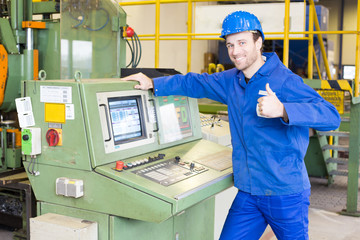 Construction worker operating a machine