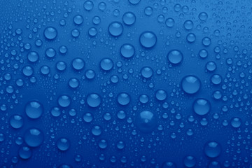 Water drops on blue background
