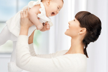 happy mother with adorable baby