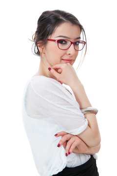 Isolated girl with eyeglasses touching her chin on white