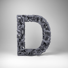 Letter D made out of scrambled small letters in studio setting