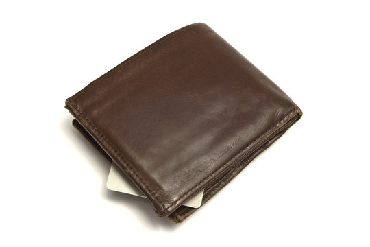 Brown wallet and credit card