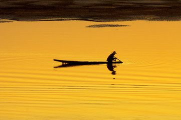 Boat on Mekong at Sunset
