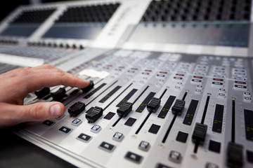 Hand on a sound fader in Television Gallery