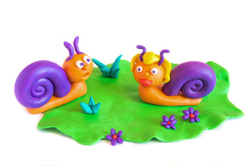 Two snails, clay modeling.