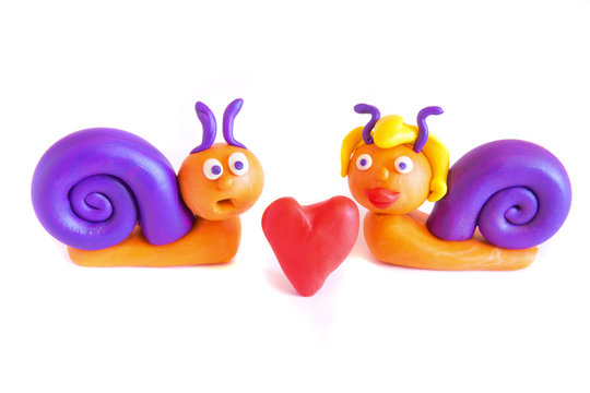 Snails in love, clay modeling.
