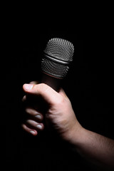 Hand and microphone