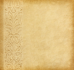 Old worn paper with oriental ornament.
