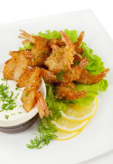 Fried prawns in coconut breading with dipping sauce