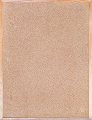 cork board in wood frame