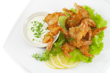 Fried prawns in coconut breading with dipping sauce