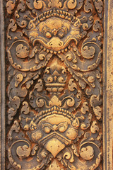 Fototapeta na wymiar Dekoracyjne płaskorze¼by ścienne, Banteay Srey świątynia, Kambodża