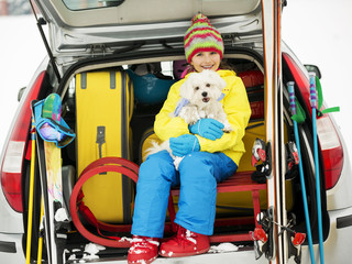 Skiing - girl ready for the travel for winter vacation