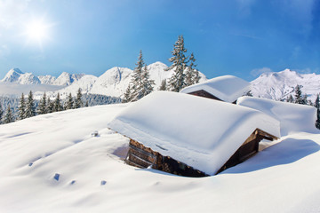 Naklejka premium Snow covered hut winter landscape