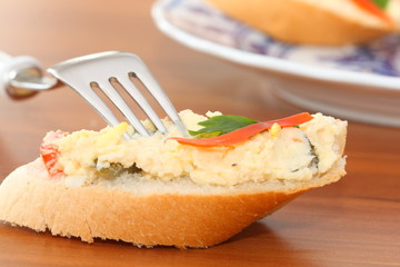 slice of French bread with salad