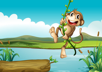 Un singe joyeux jouant avec la vigne