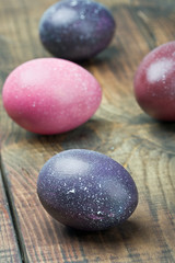 painted Easter eggs on wooden table