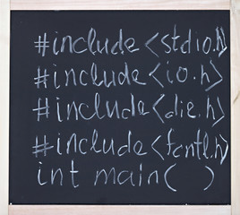 Programming language expressions in chalk on blackboard