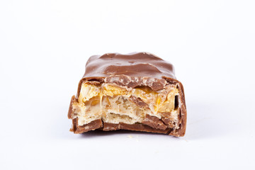 Closeup of chocolate bar isolated on white