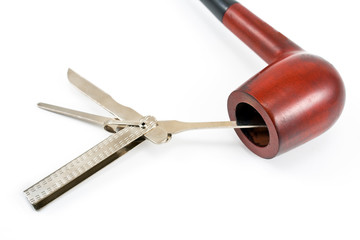 Tobacco pipe and cleaning tool