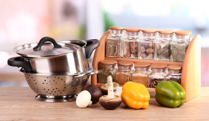 composition of kitchen tools,spices and vegetables