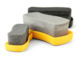 Shoe shine sponges, on color background