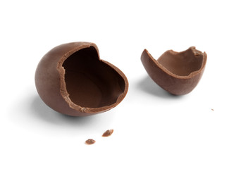 Broken chocolate egg, isolated on white - 49470690
