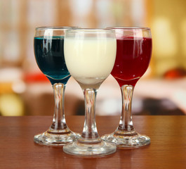 Tasty color liquors, on bright background