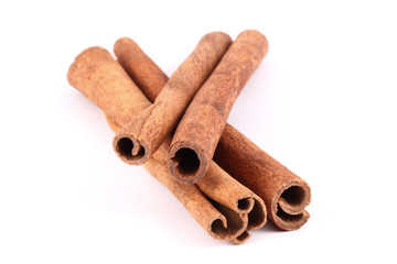 Four cinnamon sticks stacked