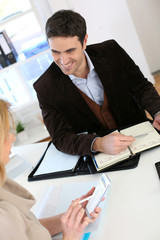 Woman meeting lawyer to set up her own business