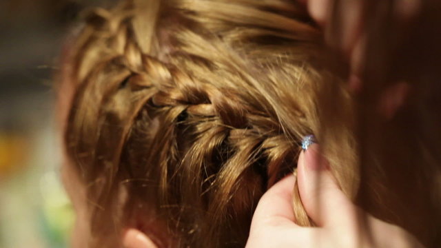 Barber makes the pigtail.