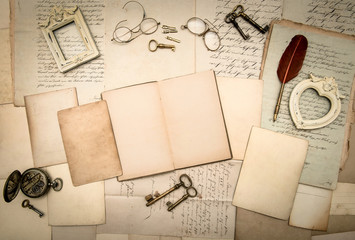 open book, vintage accessories, old letters and documents