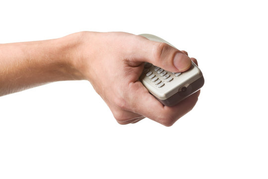 Man's hand with tv remote