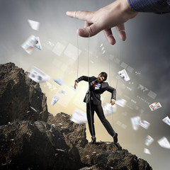 Business man marionette