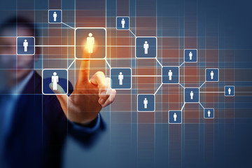 Image of male touching icon of social network