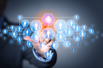 Image of male touching icon of social network