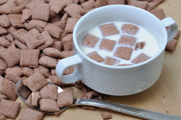 Bowl of milk and breakfast chocolate crunchy