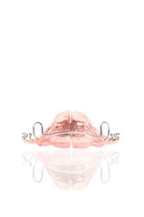 Pink orthodontics retainer