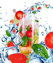 Fruit Cocktail with splashing liquid isolated on white