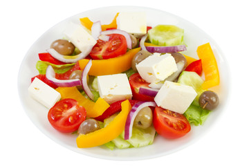 vegetable salad with cheese on the plate on white background